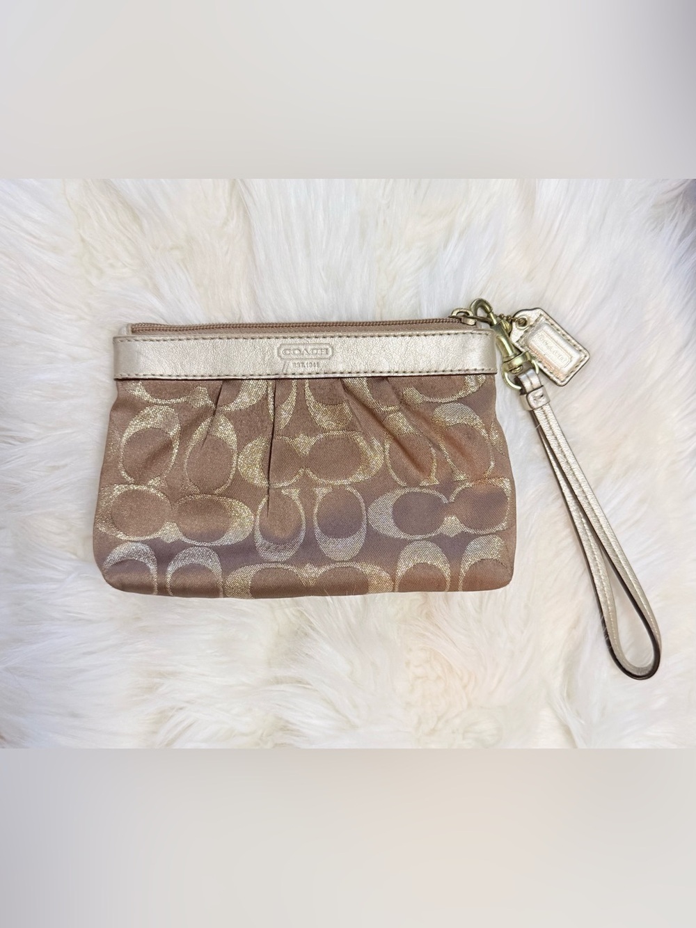 Coach Signature Wristlet in Metallic Champagne and Rose